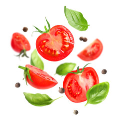 Cut tomatoes, basil and allspice in air on white background