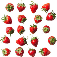 A close-up of ripe red strawberries with green leaves.
