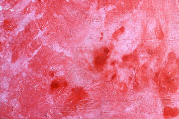 Fondo con texture materica dipinta a tempera di colore rosso cremisi; spazio per testo