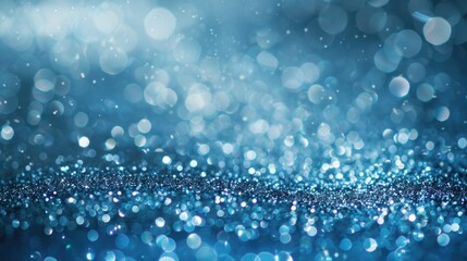 Abstract image of blue bokeh light sparkles, creating a magical and dreamy background with shimmering light effects.