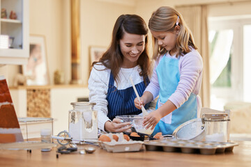 Girl, child and mother with cooking in kitchen with mixing ingredients for cookies, dessert or cake...