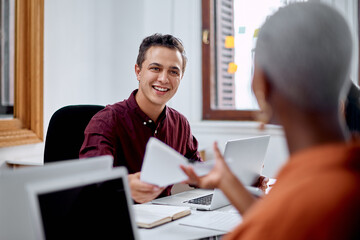 Finance consultation, contract and businessman with client in office for investment management. Documents, discussion and male financial advisor with person for budget, loan or mortgage paperwork.