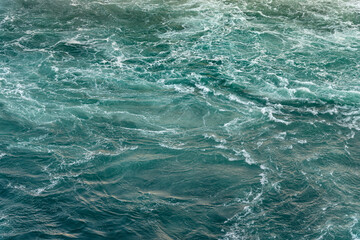 abstract background of water surface in quick mountain river