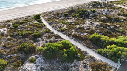 An aerial view of a sand path at City Beach in Perth, Western Australia
