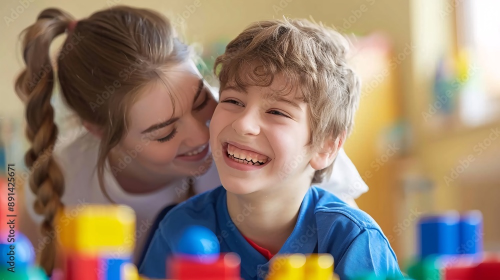 Poster occupational therapist working with a child with autism on motor skills activities stock photo with 