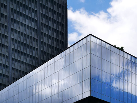 Low Angle View of Modern Buildings with Sky Reflection on Windows
