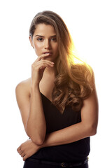Obraz premium Confident, woman and portrait with hair care in studio for salon treatment, satisfaction or pride. Serious, female person and face with shampoo shine for cosmetics, growth or glow on white background