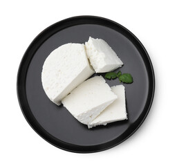 Fresh ricotta (cream cheese) and basil isolated on white, top view