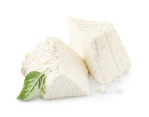Tasty ricotta (cream cheese) and basil isolated on white