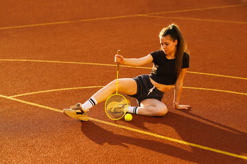 Young woman on a sports basketball court
