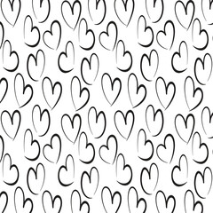 Wallpaper Seamless pattern with hand drawn ink black hearts. Cute black and white background. 
