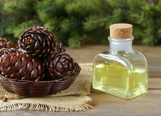 organic pine nut oil on wooden table