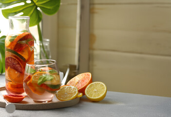 citrus tea with fresh fruits and berries