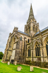 Fototapeta premium A view looking up at the spire of Chichester Cathedral in the center of Chichester, Sussex in summertime