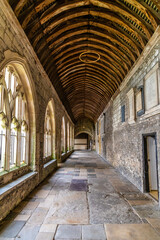 A view along a colonnade in Chichester Cathedral in the center of Chichester, Sussex in summertime