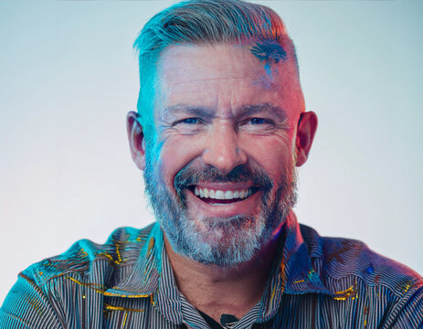 Vibrant Glitch Art of Tattooed Man Giggling in Studio with High-Contrast Effects