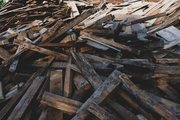 pile of old used wood waste