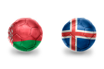 football balls with national flags of iceland and belarus, soccer teams. on the white background.