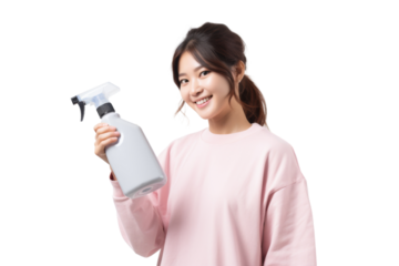 Young Asian housewife smiling while holding cleaning spray and cloth isolated on white background