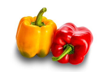 Closeup of fresh yellow and red bell pepper, paprika isolated on white background with clipping path.