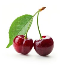 two fresh red cherries with leaves on top