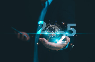 Hand holding the modern and digital globe with 2025 new year on modern background, Digital transformation trend in 2025, Technology trend, business transformation. Preparation for disruptions.