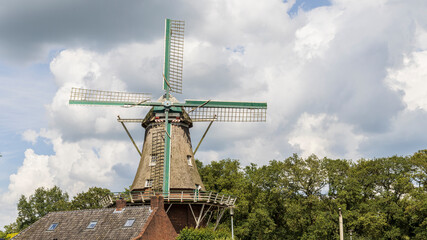 Floor windmill in the center of village Norg in Municipality Noordenveld in the Netherlands. Traditional Esdorp in Northern Drenthe.