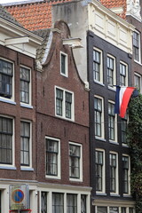 Amsterdam Binnen Brouwersstraat Brick House Facade with Clock Gable, Netherlands