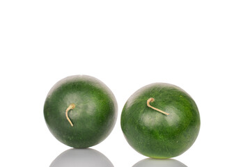 Two ripe sweet watermelons, macro, isolated on white background.