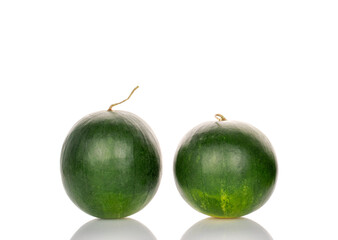 Two ripe sweet watermelons, macro, isolated on white background.