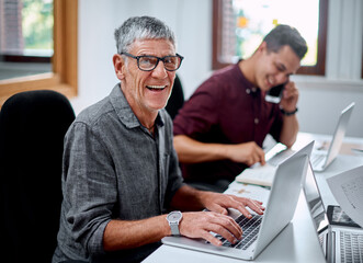 Laptop, portrait and mature man in office for it support management report with online email....