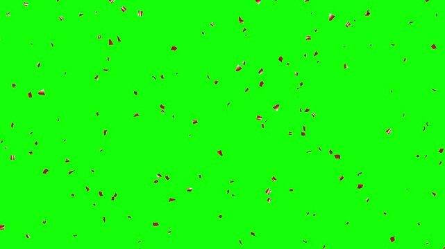 Falling Red foil Confetti on Green Background