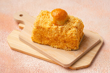 Nastar Cake is vanilla sponge based with crumbs, layered by pineapple jam and cheese cream. Topping with nastar cookies crumbs