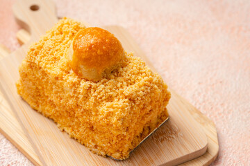 Nastar Cake is vanilla sponge based with crumbs, layered by pineapple jam and cheese cream. Topping with nastar cookies crumbs