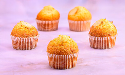 Muffins Arranged in Pentagon Shape on Marble