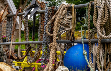 Close and selective focus of ropes, chains and fishing gear in Watermouth Harbour, Devon