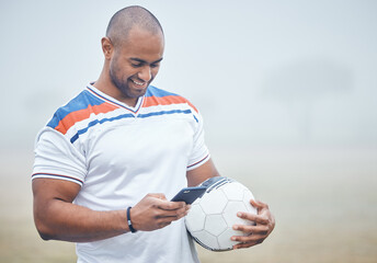 Outdoor, soccer player and smartphone for social media, reading blog or streaming video on field....