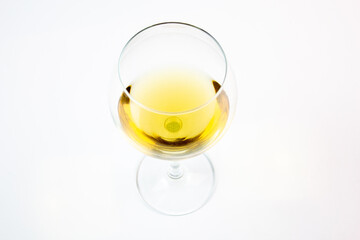 Wine glass on white background. A glass with a drink,alcohol isolated, close-up.