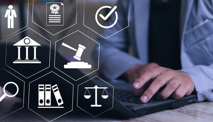 Businessman touching law icons on virtual screen for business legal advice, Labor law, Lawyer, Attorney at law, Legal advice business concept.