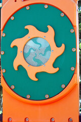 Full view of park playground spinner with steel beads for background