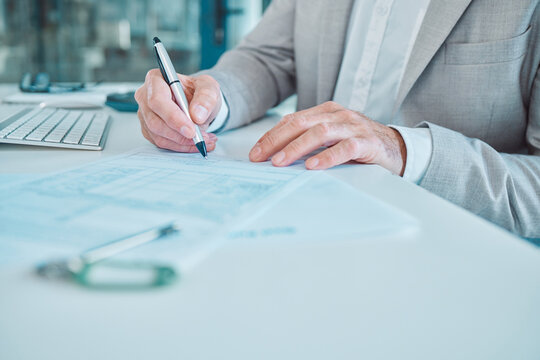 Hands, writing and paperwork for real estate in office with keys, agreement and deal with signature. Person, realtor and documentation for rent, lease and sale for property with finance for mortgage