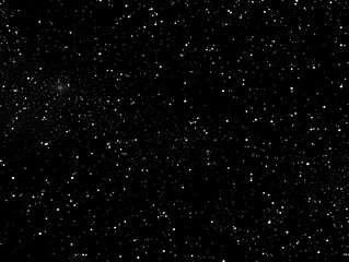 Obraz premium A dark and mysterious night sky with a vast expanse of twinkling stars, symbolizing the vastness of the universe, the endless possibilities, and the beauty of the cosmos.