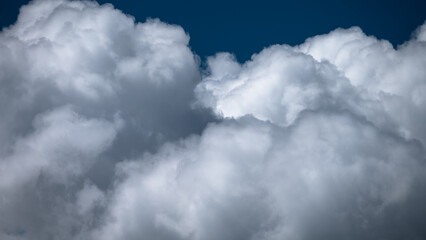 Mountainous Cumulus Clouds Boiling in the Summer Sky