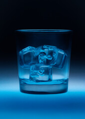 glass with ice for whiskey with blue stain
