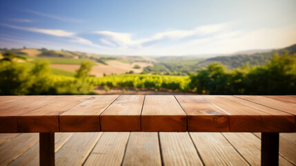 Fototapeta premium Empty wooden bench in front of farmland, vineyards.