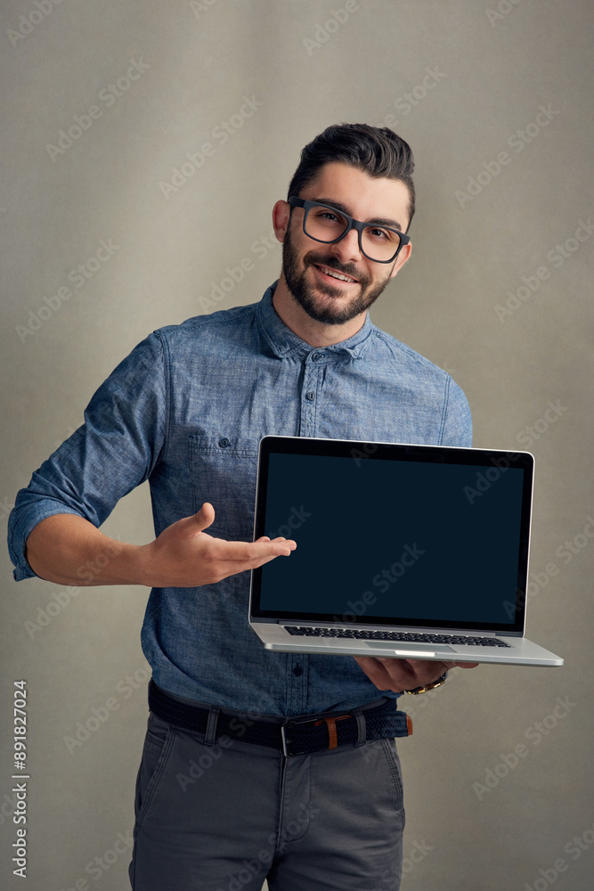 Poster studio, presentation and portrait of businessman with laptop screen for advertising, information and