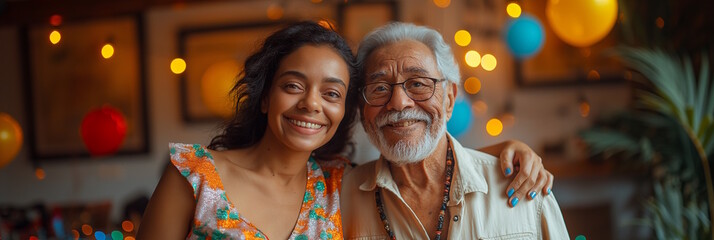Smiling latina woman and elderly latino man with bokeh lights and balloons in the background. Concept for celebration, family bonding, and festive events, suitable for party themes and Grandparent's D