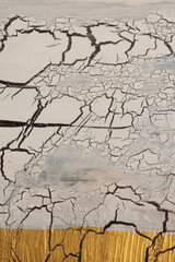 Craquelure scratch texture painting crumpled wall background. Gold, white, beige color.