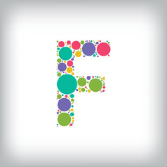 Letter F made of creative colored dots or filled with circles. Creative fonts with unique symbols. Vector illustration.