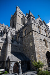 Fototapeta premium Christ Church Cathedral, more formally The Cathedral of the Holy Trinity, in Dublin, Ireland, looking at the exterior of the building.
